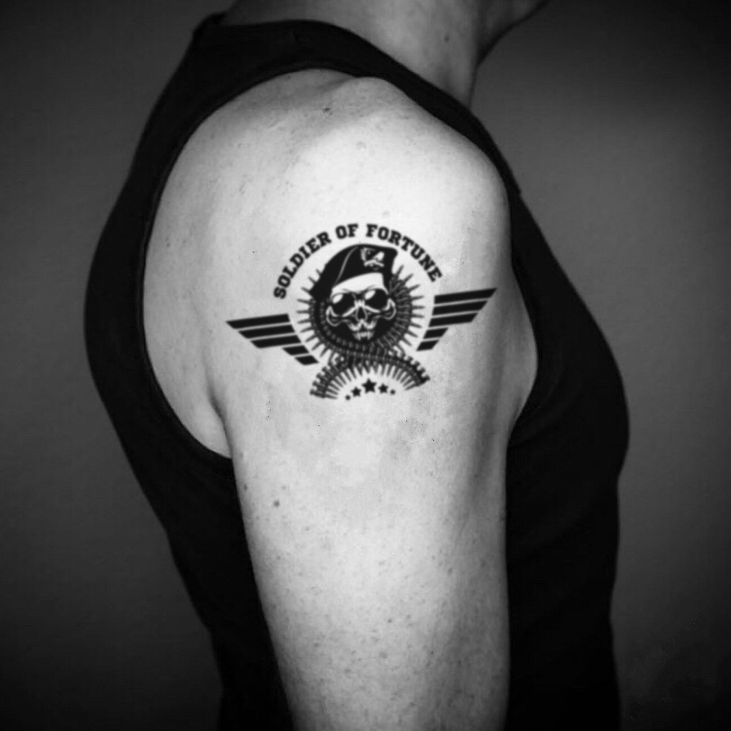 fake big special forces skull military illustrative temporary tattoo sticker design idea on upper arm