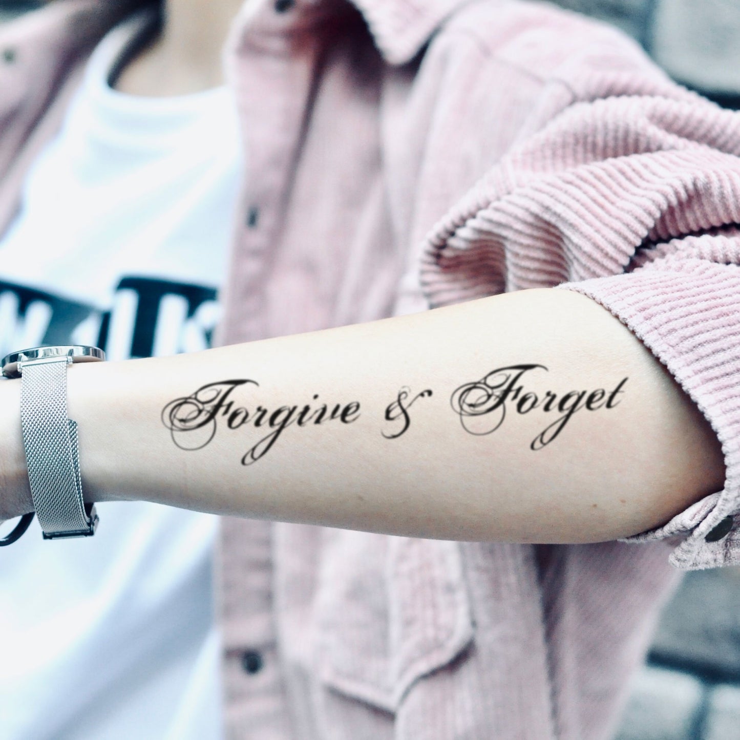 fake medium forgive and forget lettering temporary tattoo sticker design idea on forearm