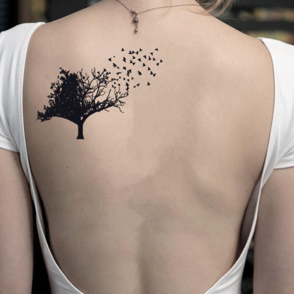 Bird in a Tree Tattoo: Nature Meets Art