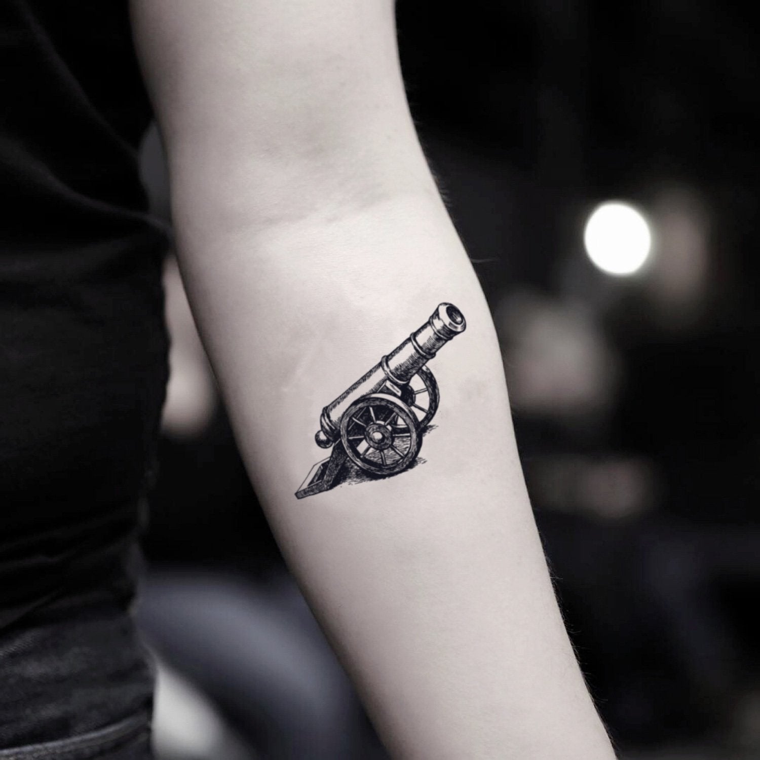 fake small cannon artillery illustrative vintage temporary tattoo sticker design idea on inner arm