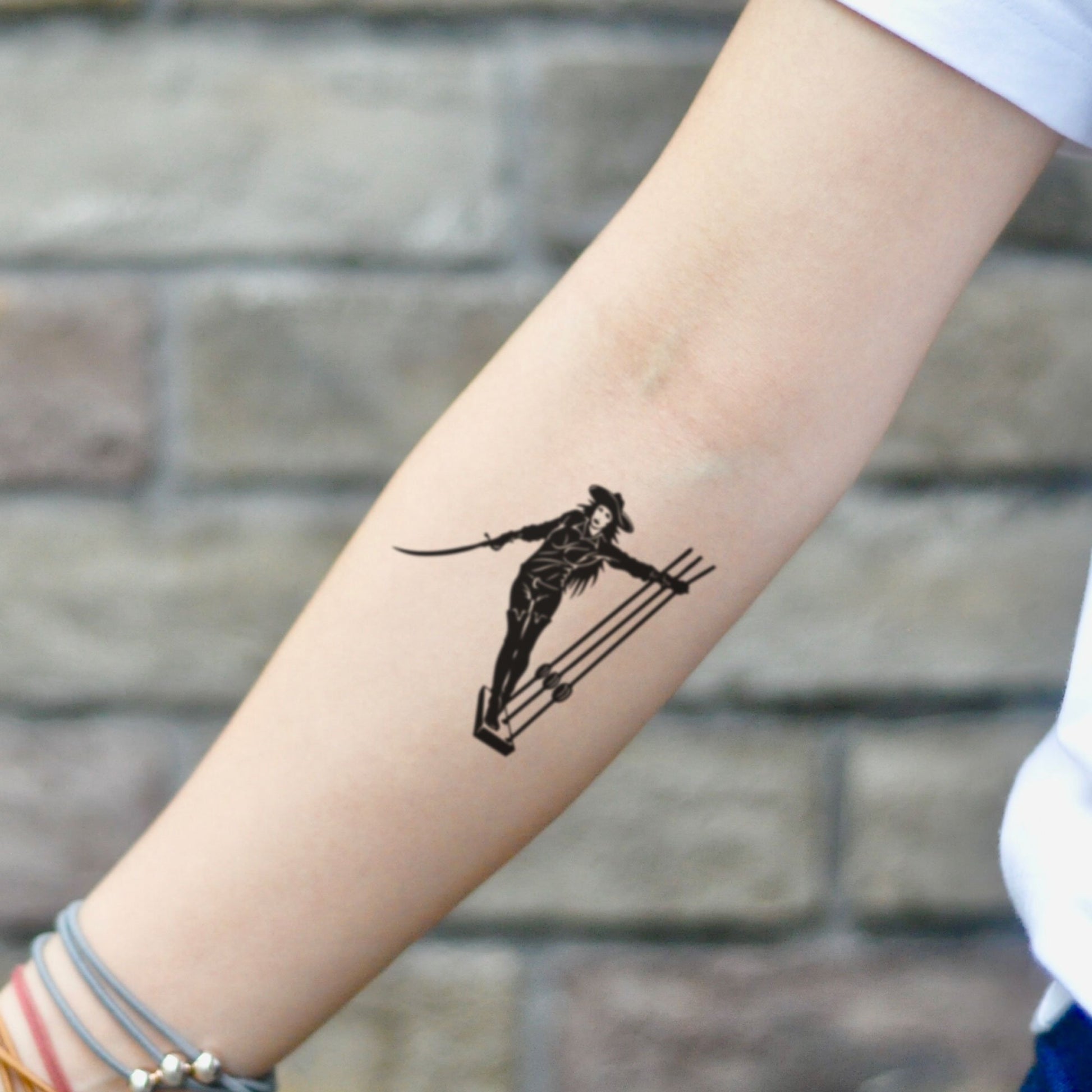 fake small female pirate illustrative temporary tattoo sticker design idea on inner arm