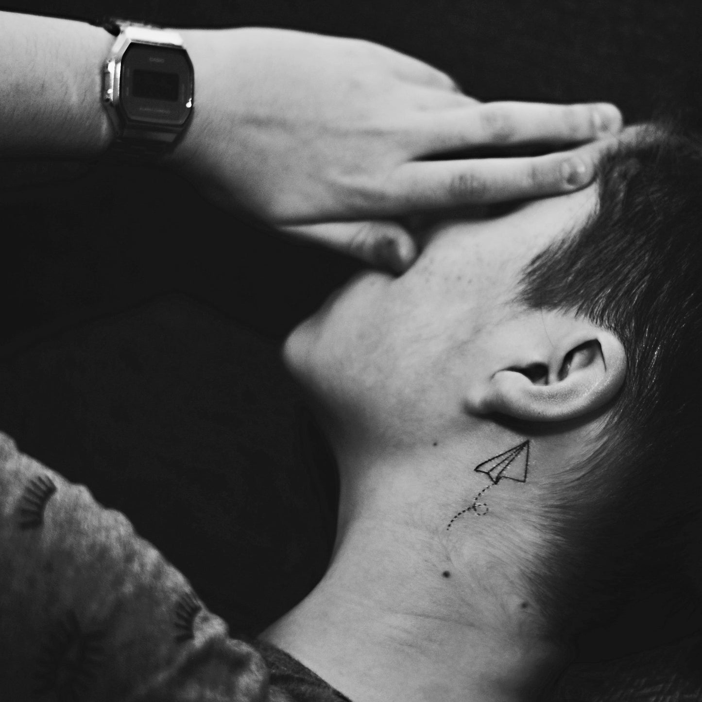 fake small paper plane airplane minimalist temporary tattoo sticker design idea on neck