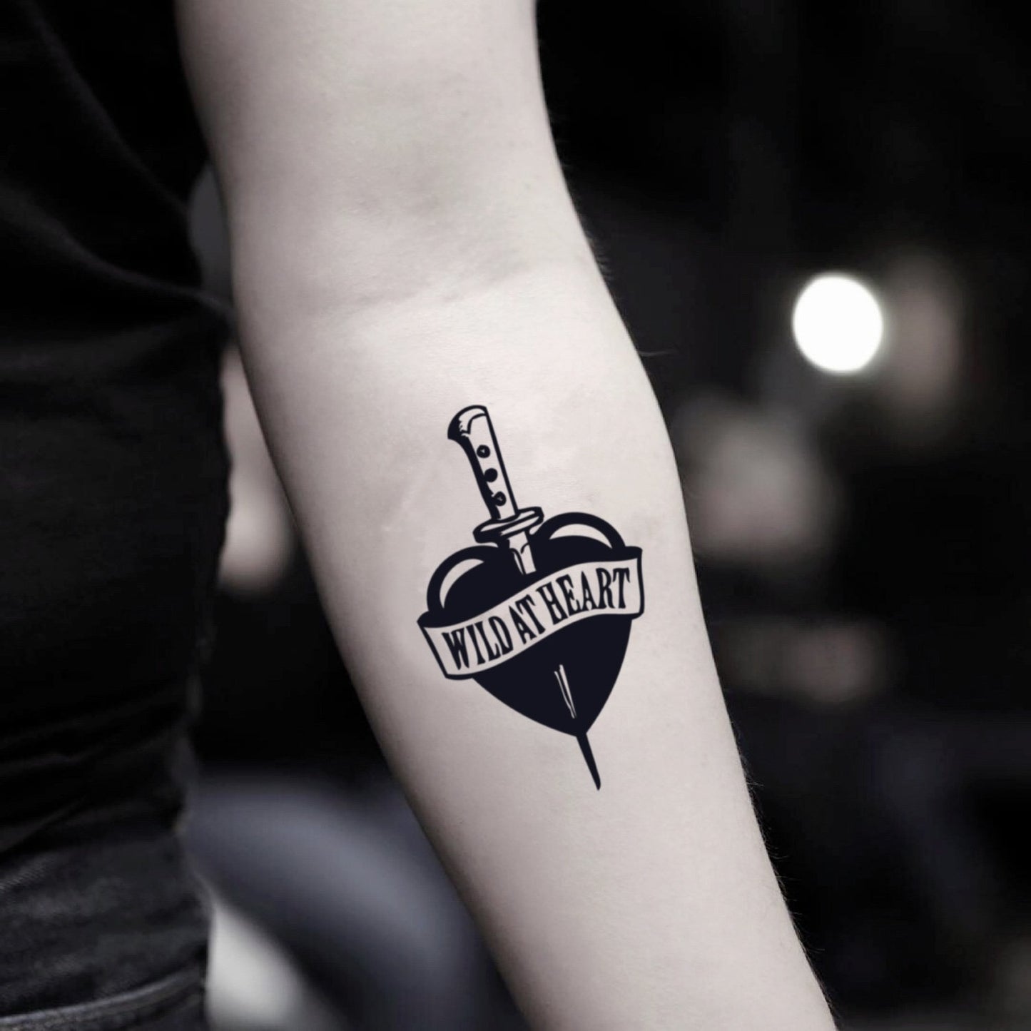 fake small wild at heart illustrative temporary tattoo sticker design idea on inner arm