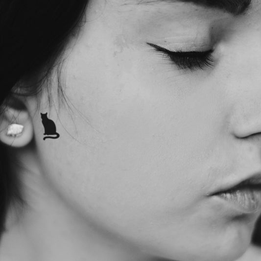 fake tiny cat behind the ear piercing animal temporary tattoo sticker design idea on face