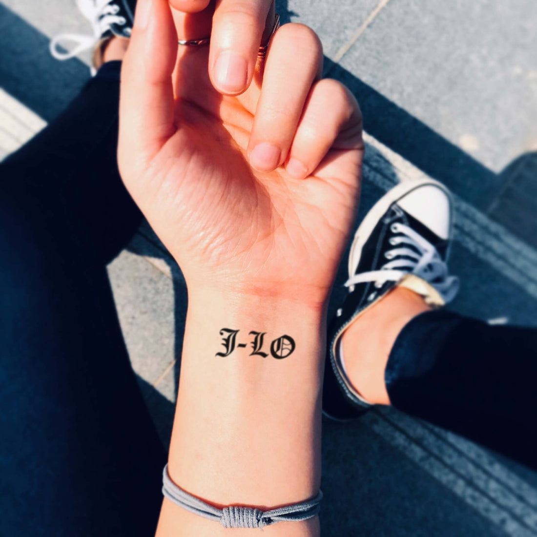 Jennifer Lopez J Lo custom temporary tattoo sticker design idea inspiration meanings removal arm wrist hand words font name signature calligraphy lyrics tour concert outfits merch accessory gift souvenir costumes wear dress up code