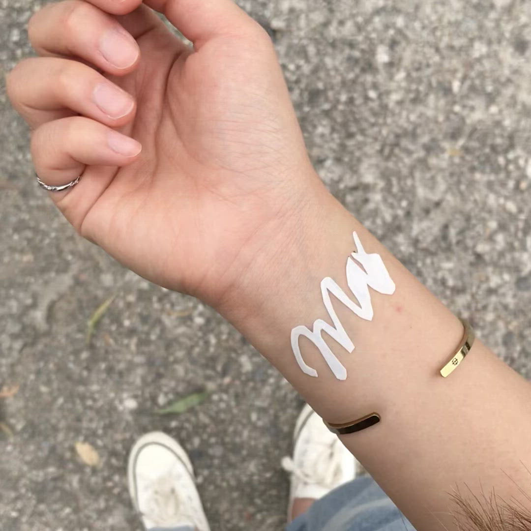 fake small max maximum lettering temporary tattoo sticker design idea on wrist