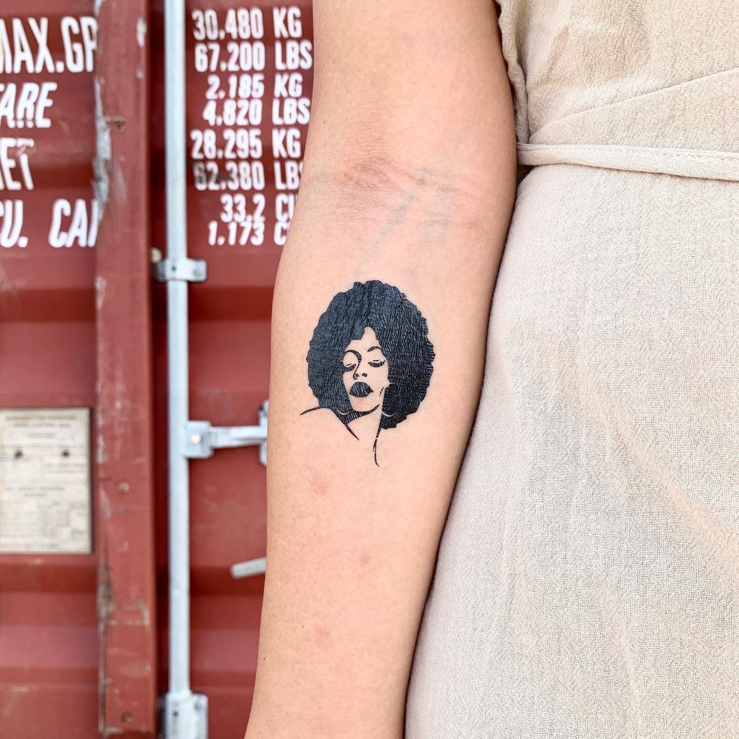 fake small afro afrocentric black lives matter woman skin lady people portrait temporary tattoo sticker design idea on inner arm
