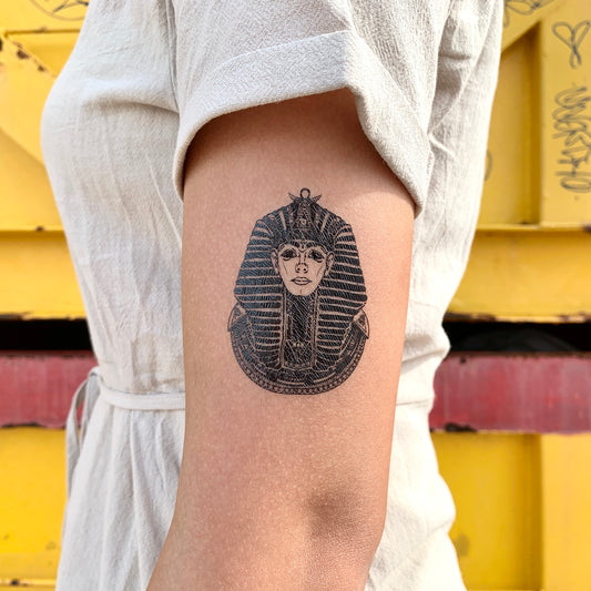 fake small ancient egyptian faraon sphinx gods art illustrative temporary tattoo sticker design idea on upper arm