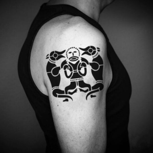 fake big anglo saxon tribal temporary tattoo sticker design idea on upper arm