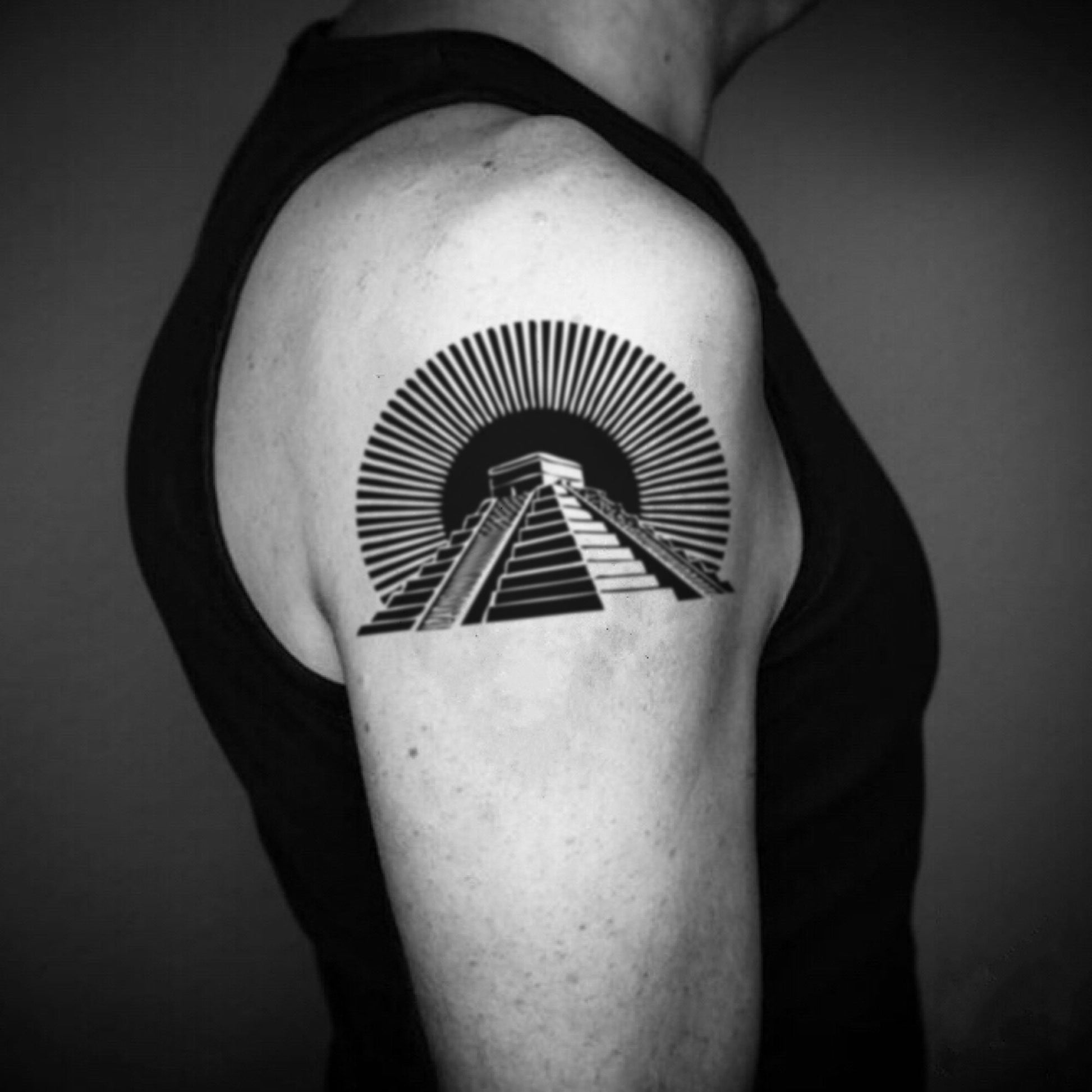 fake big aztec pyramid illustrative temporary tattoo sticker design idea on upper arm