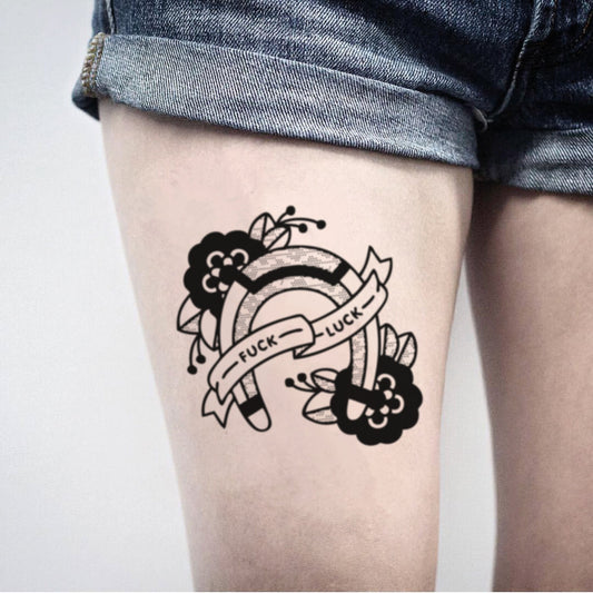 fake big bad luck illustrative temporary tattoo sticker design idea on thigh