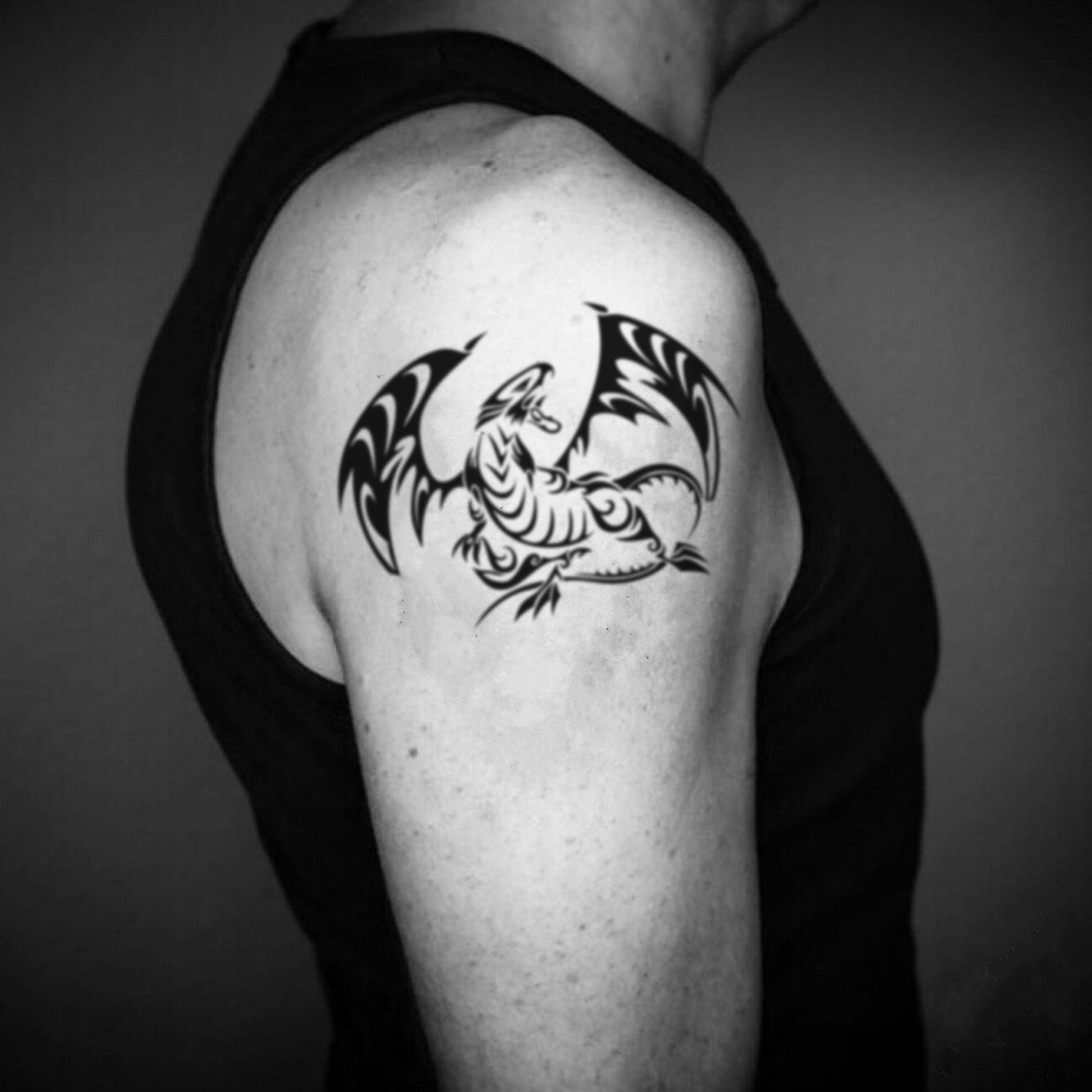 fake big blue eyes white dragon illustrative temporary tattoo sticker design idea on upper arm