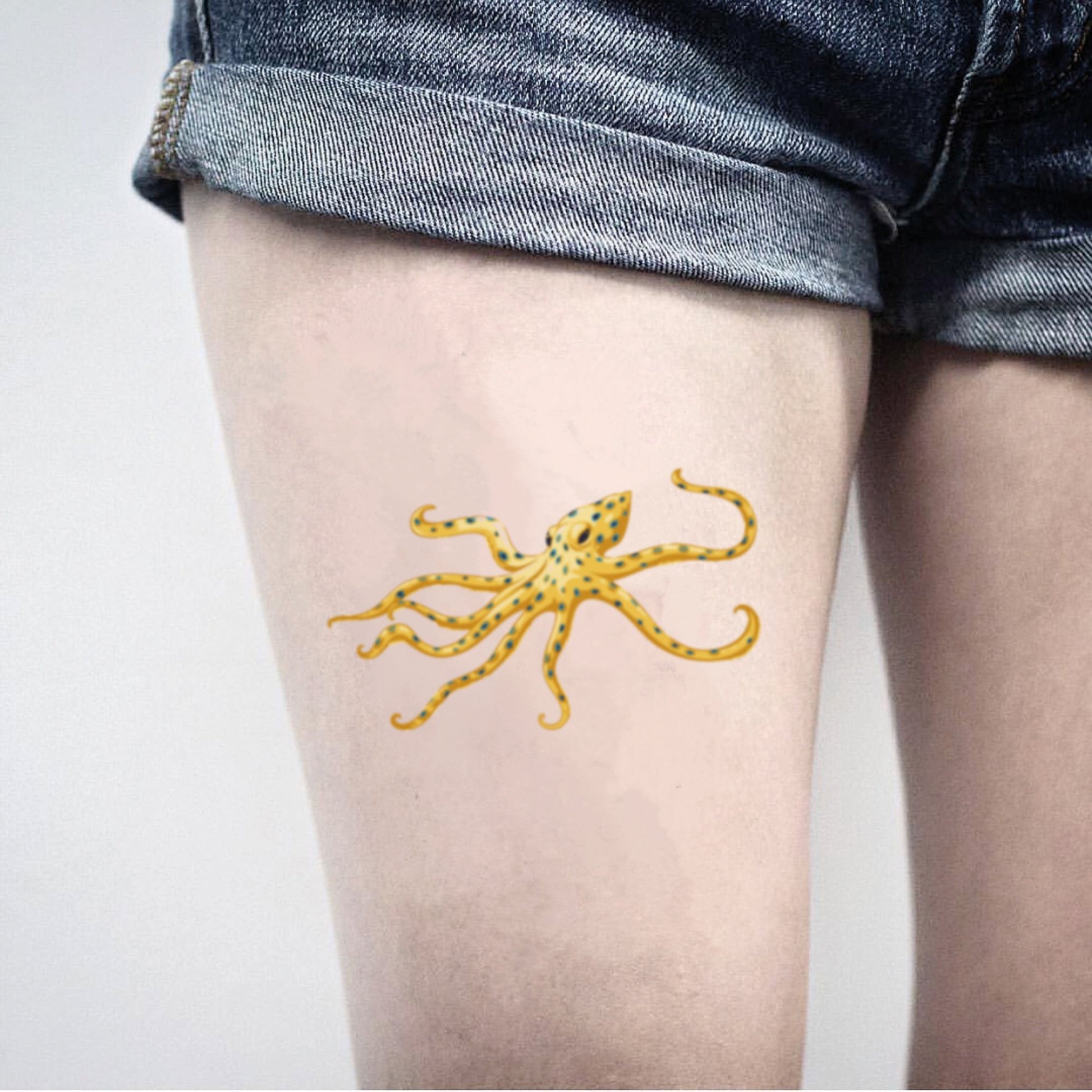 fake big blue ringed octopus animal temporary tattoo sticker design idea on thigh