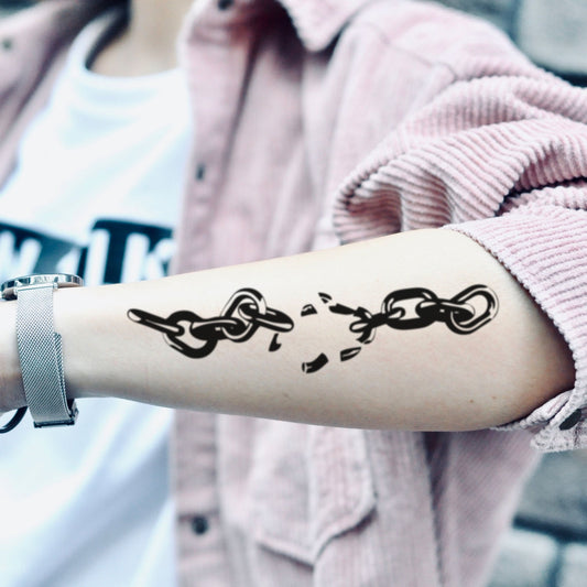 fake big breaking broken chains illustrative temporary tattoo sticker design idea on forearm