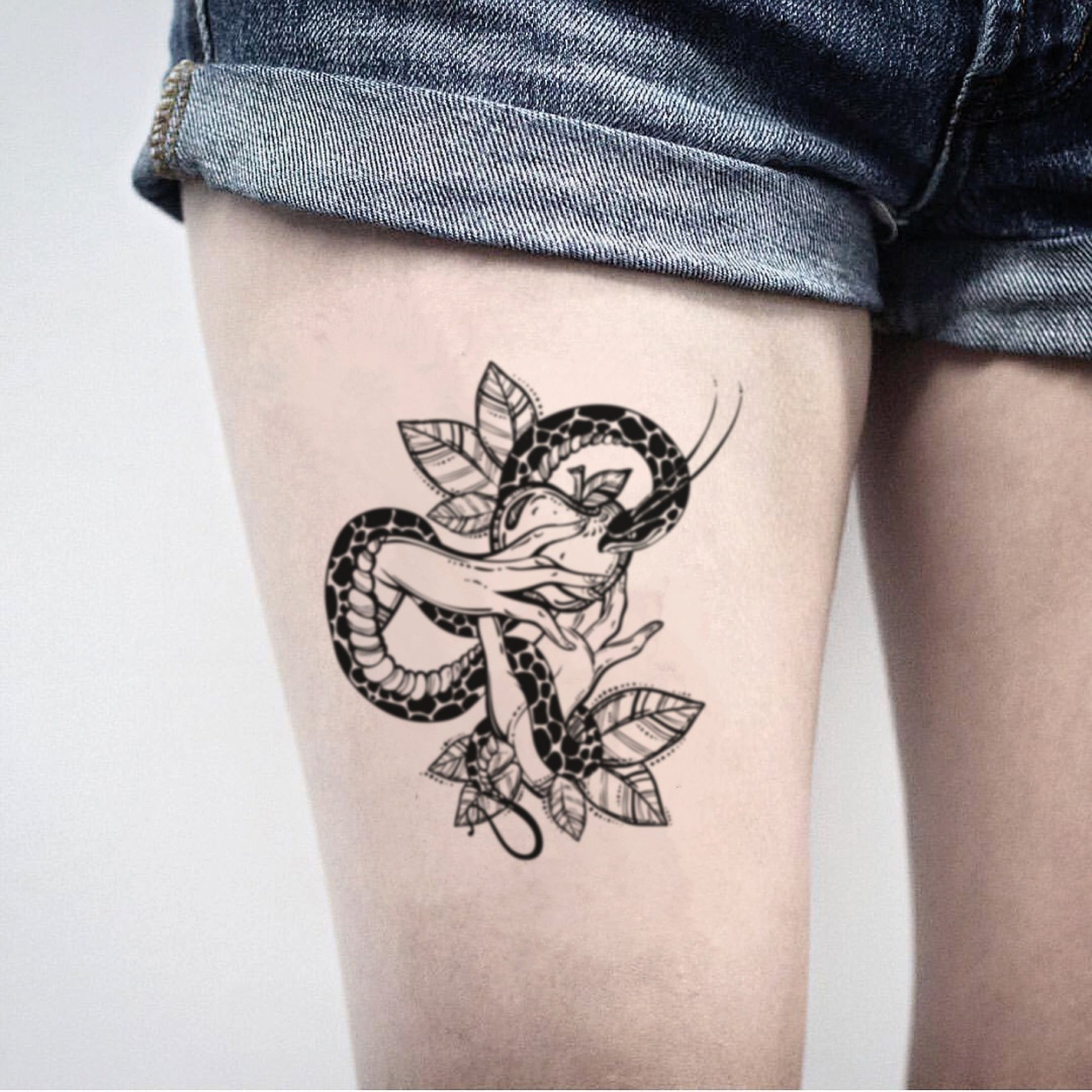 fake big forbidden fruit garden of eden love illustrative temporary tattoo sticker design idea on thigh