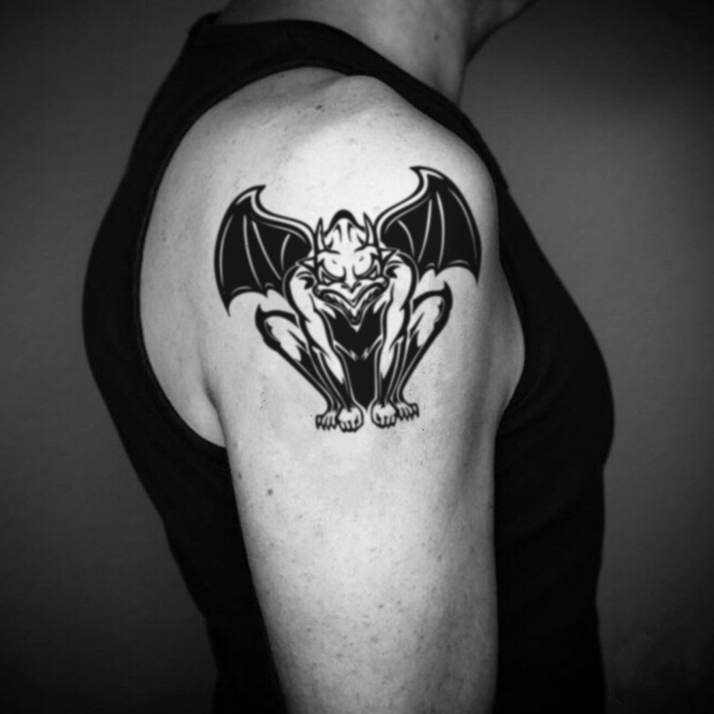 fake big gargoyle gothic evil tribal temporary tattoo sticker design idea on upper arm