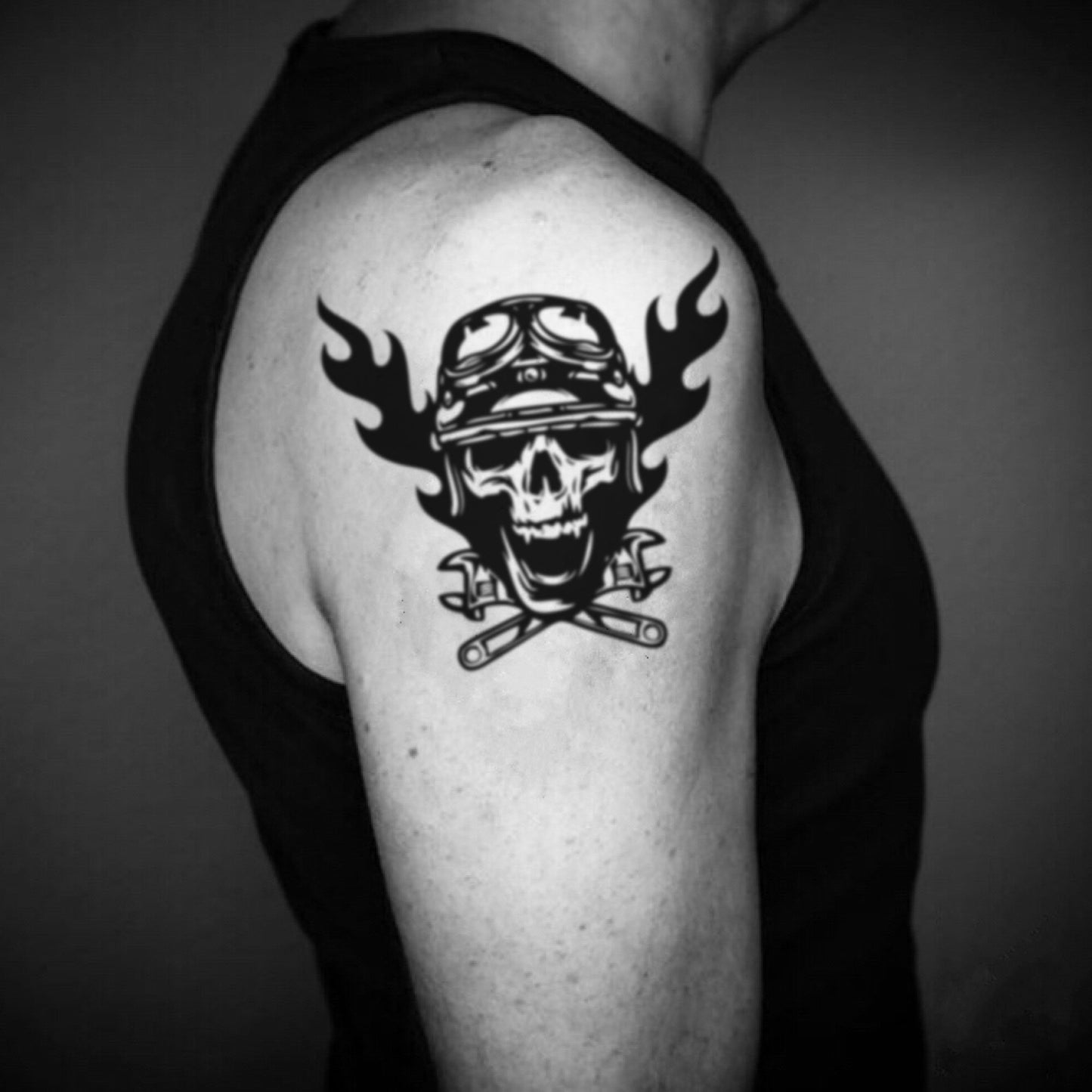 fake big ghost rider skull flame fire illustrative temporary tattoo sticker design idea on upper arm