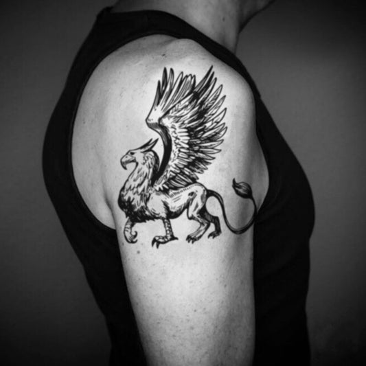 fake big griffin gryphon mythical creature animal temporary tattoo sticker design idea on upper arm