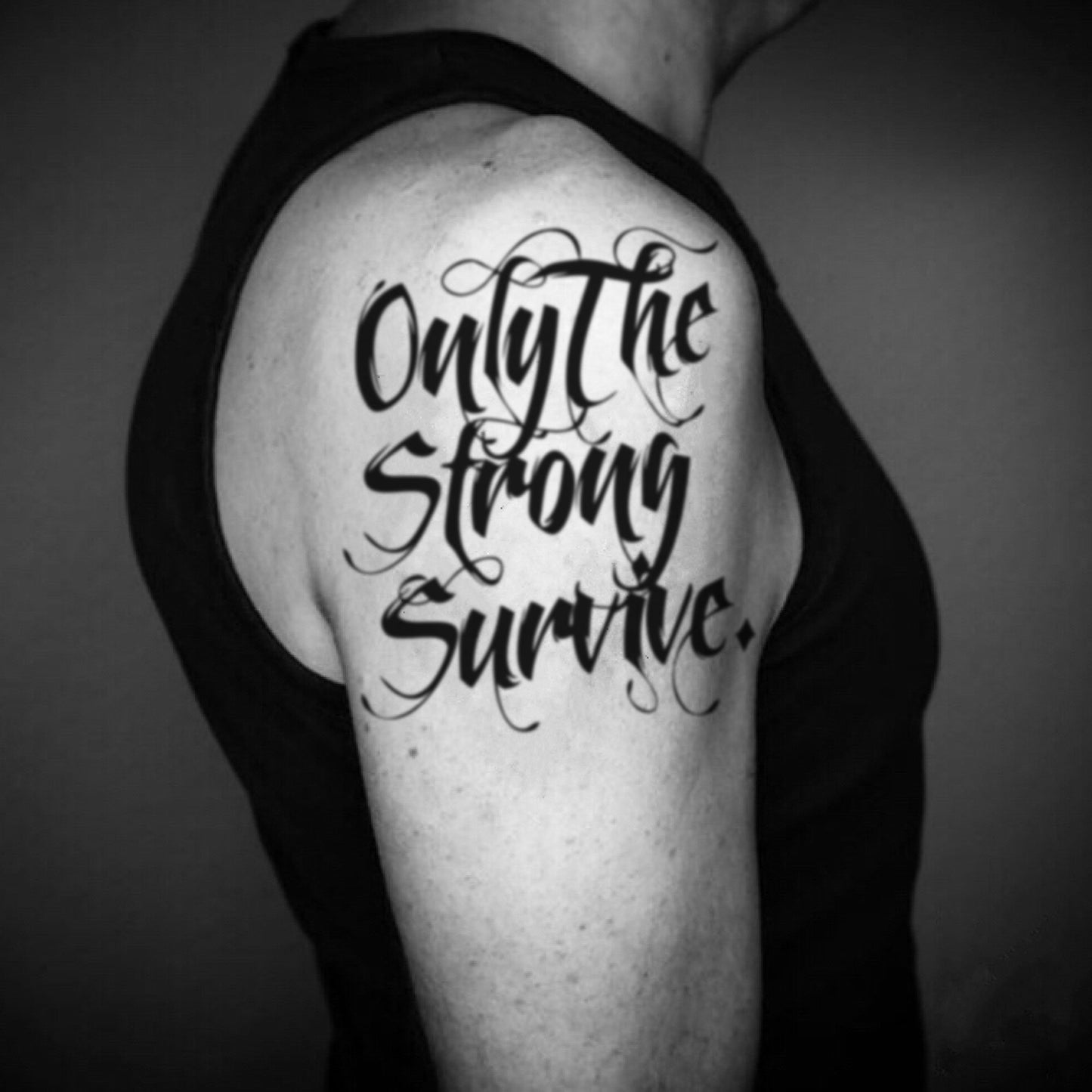 fake big only the strong survive quote lettering temporary tattoo sticker design idea on upper arm