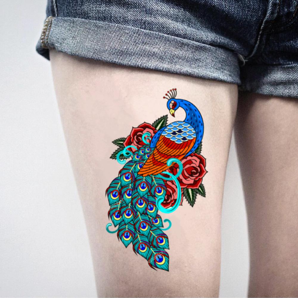 fake big peacock color animal temporary tattoo sticker design idea on thigh