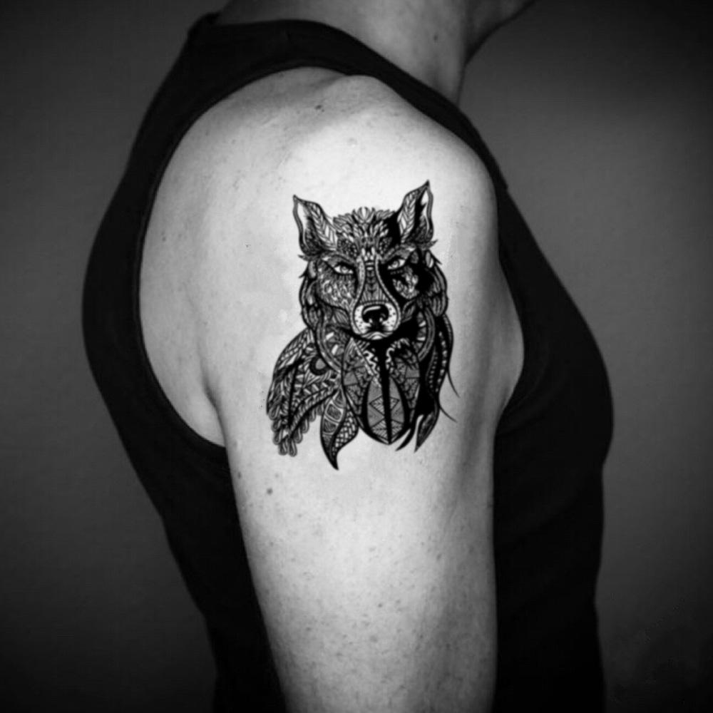 fake big tribal wolf pack coyote animal temporary tattoo sticker design idea on upper arm