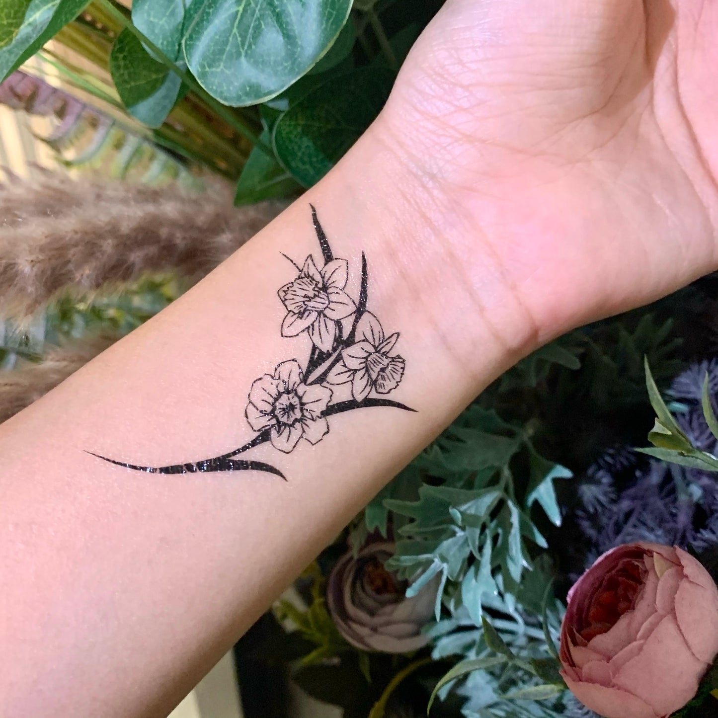 fake small daffodil cattleya hawthorn flower temporary tattoo sticker design idea on wrist