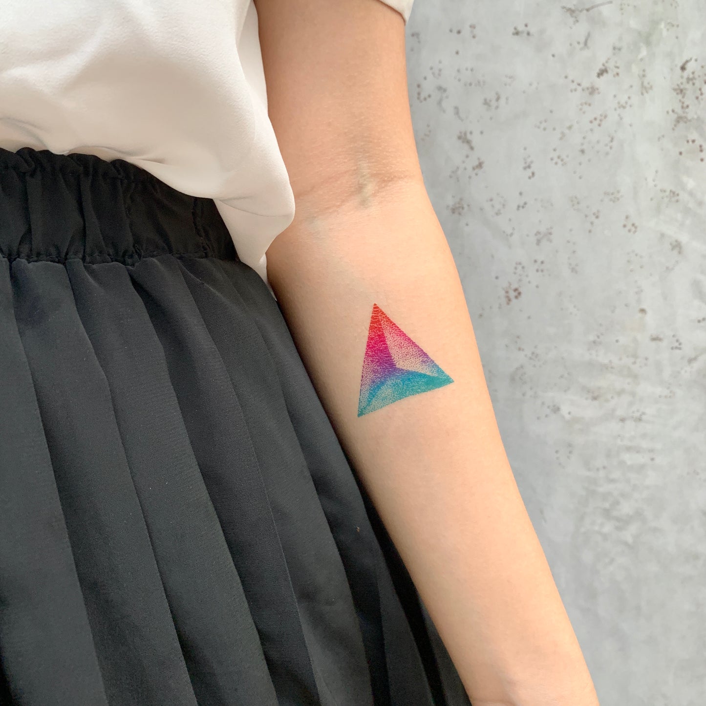 fake small prism rainbow pointillism color theory temporary tattoo sticker design idea on inner arm