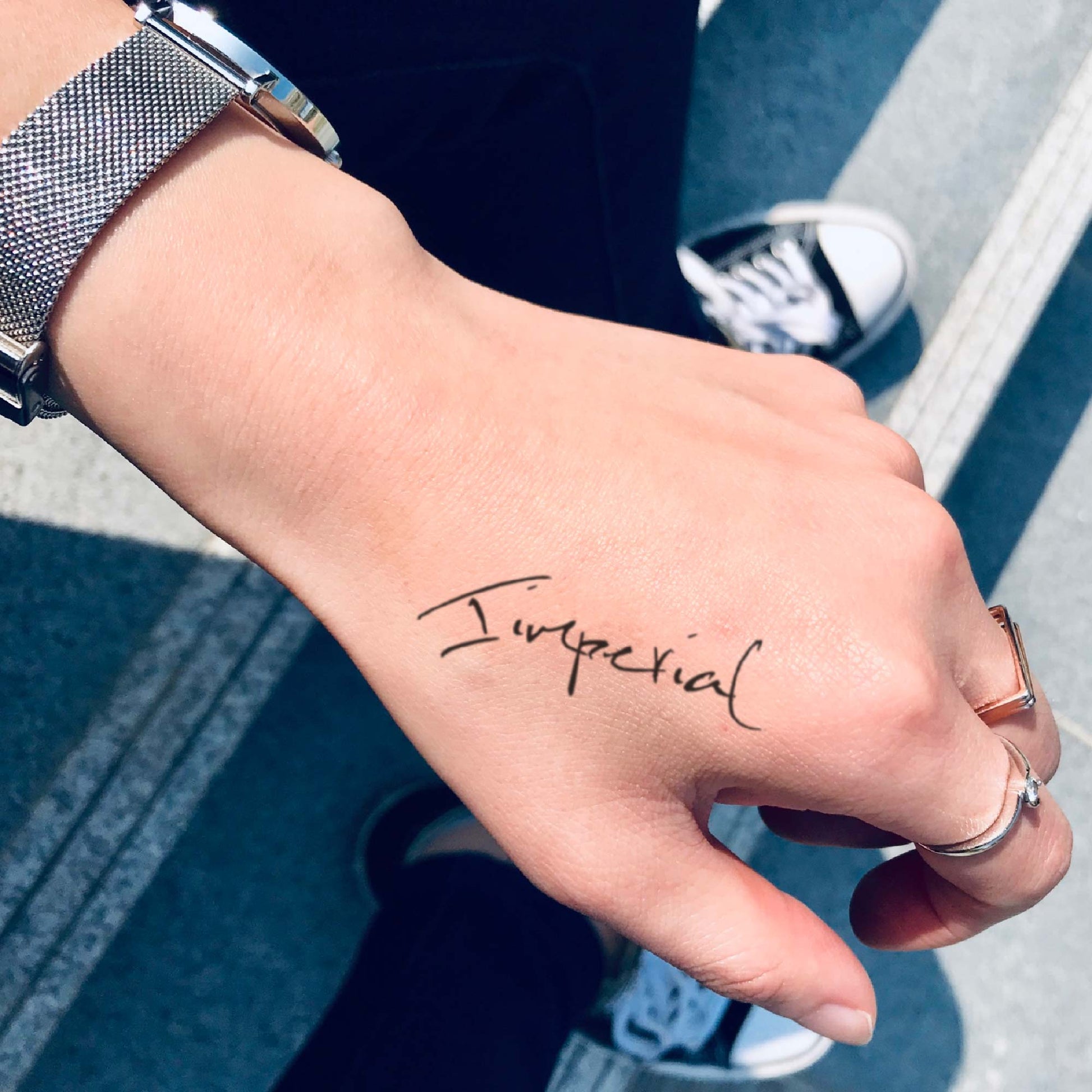 fake small imperial lettering temporary tattoo sticker design idea on hand
