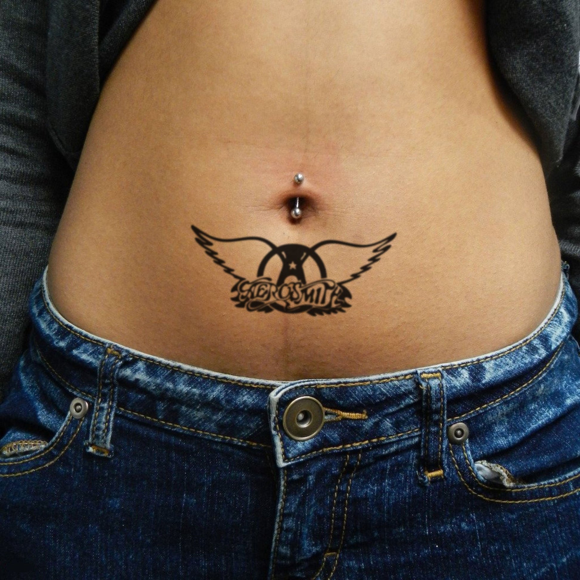 fake medium aerosmith illustrative temporary tattoo sticker design idea on stomach