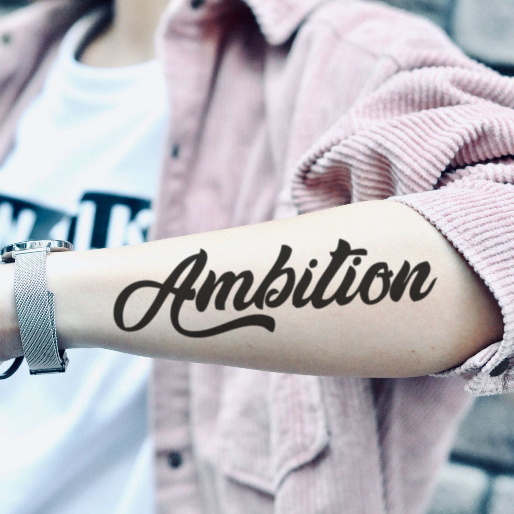 fake medium ambition ambitious cursive script lettering temporary tattoo sticker design idea on forearm