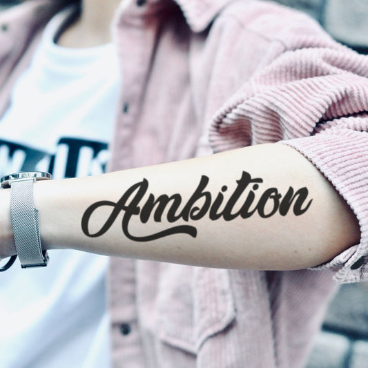 fake medium ambition ambitious cursive script lettering temporary tattoo sticker design idea on forearm