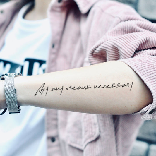 fake medium by any means necessary lettering temporary tattoo sticker design idea on forearm
