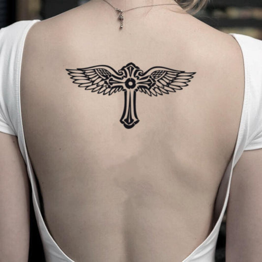 fake medium cross with wings illustrative temporary tattoo sticker design idea on back