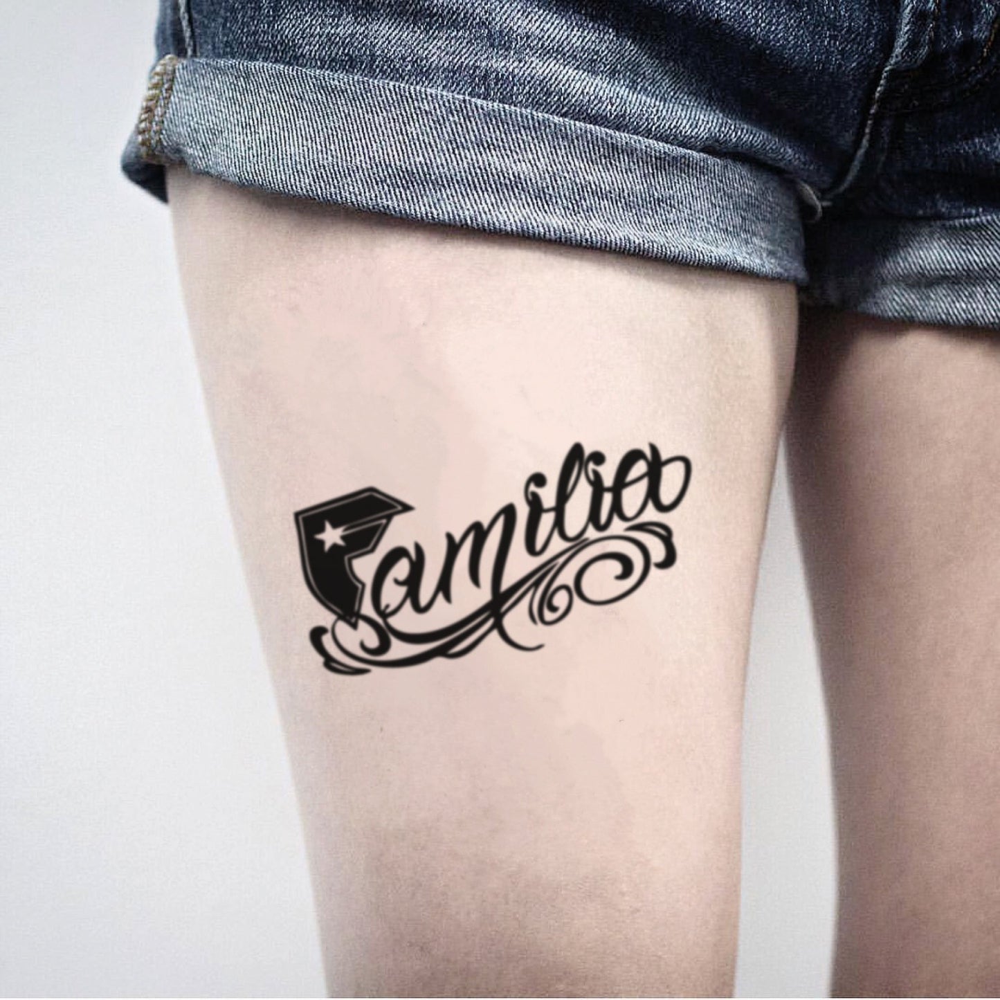 fake medium famous stars and straps lettering temporary tattoo sticker design idea on thigh