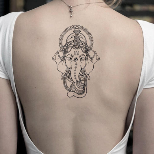 fake medium lord ganesha east indian hindu culture elephant animal bohemian temporary tattoo sticker design idea on back