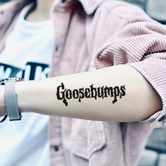 fake medium goosebumps lettering temporary tattoo sticker design idea on forearm