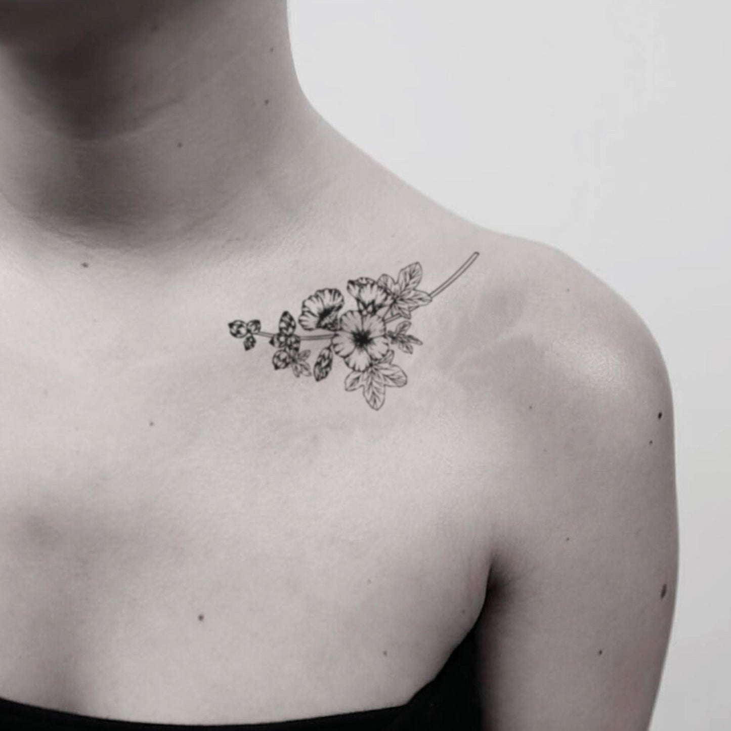 fake medium hollyhock flower temporary tattoo sticker design idea on shoulder