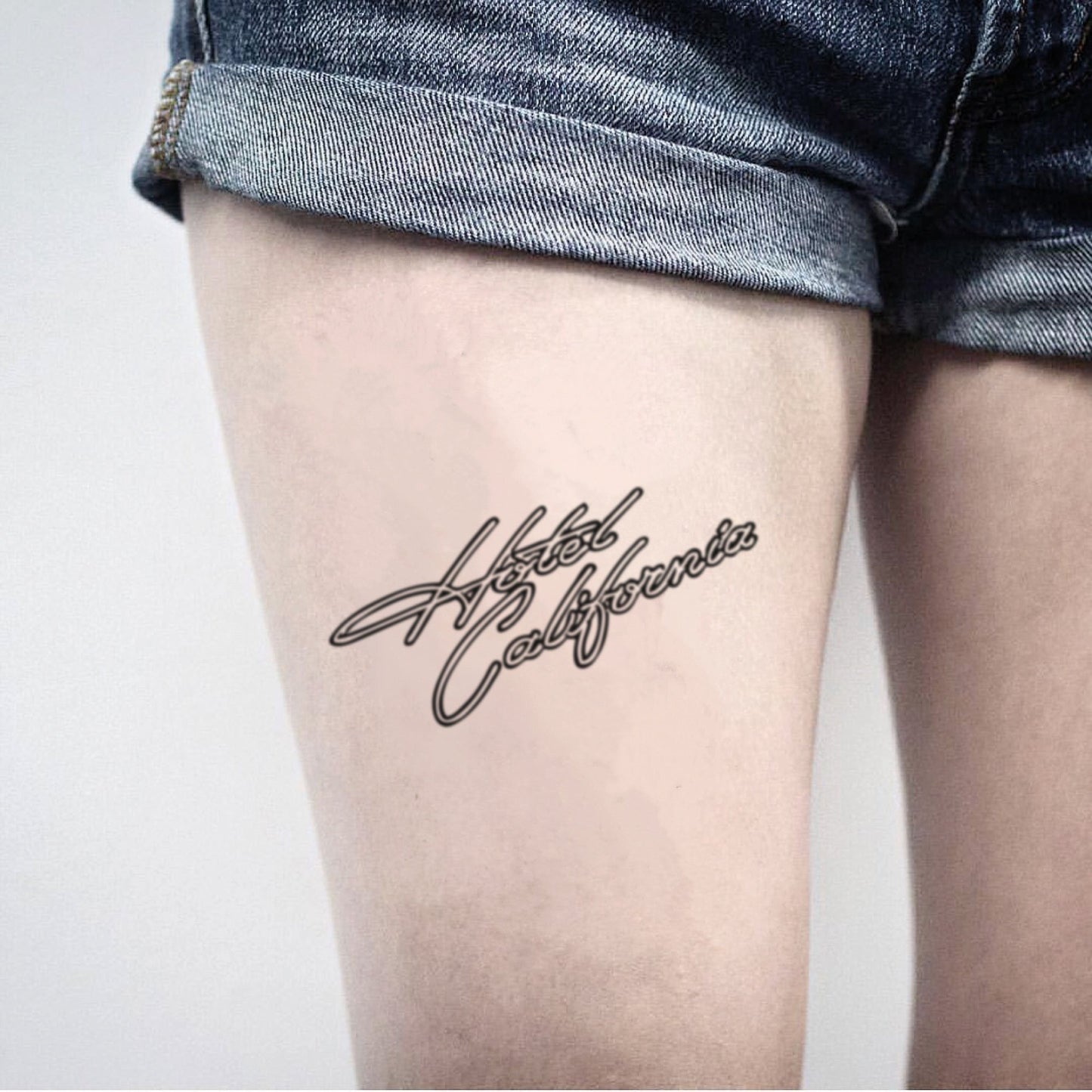 fake medium hotel california lettering temporary tattoo sticker design idea on thigh
