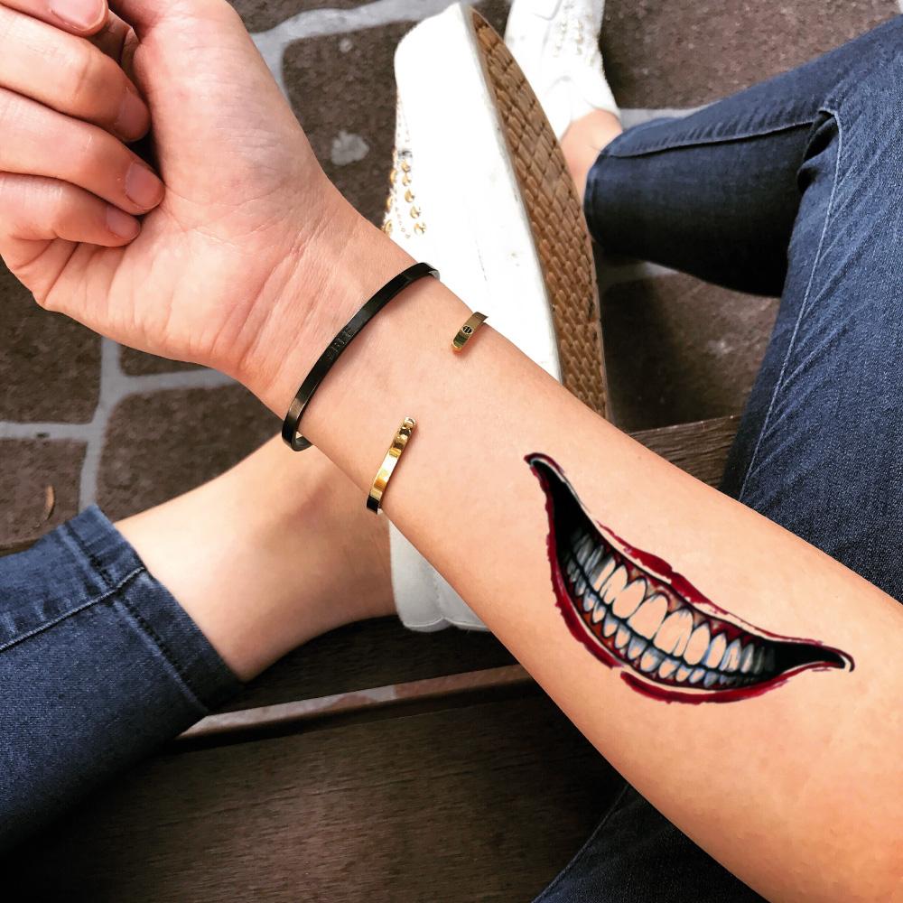 fake medium joker smile big mouth color temporary tattoo sticker design idea on forearm