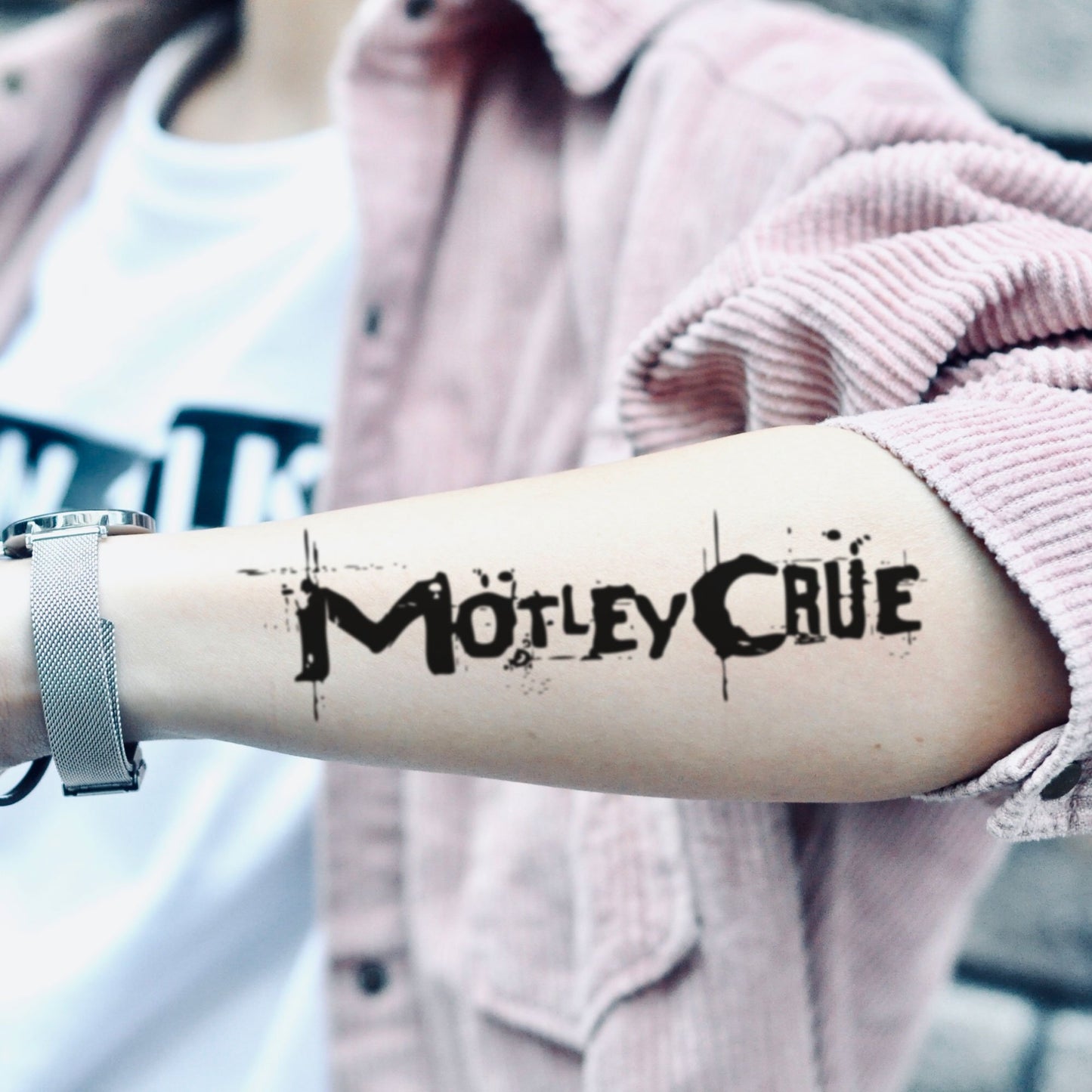 fake medium motley crue lettering temporary tattoo sticker design idea on forearm