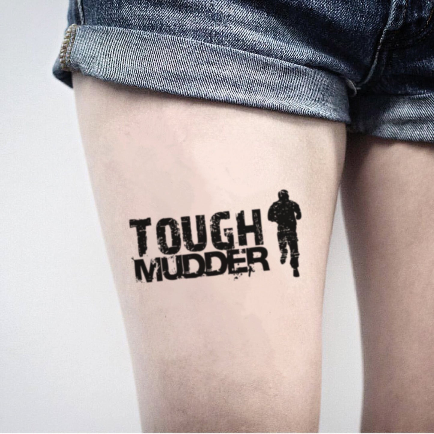 fake medium tough mudder upper leg lettering temporary tattoo sticker design idea on thigh