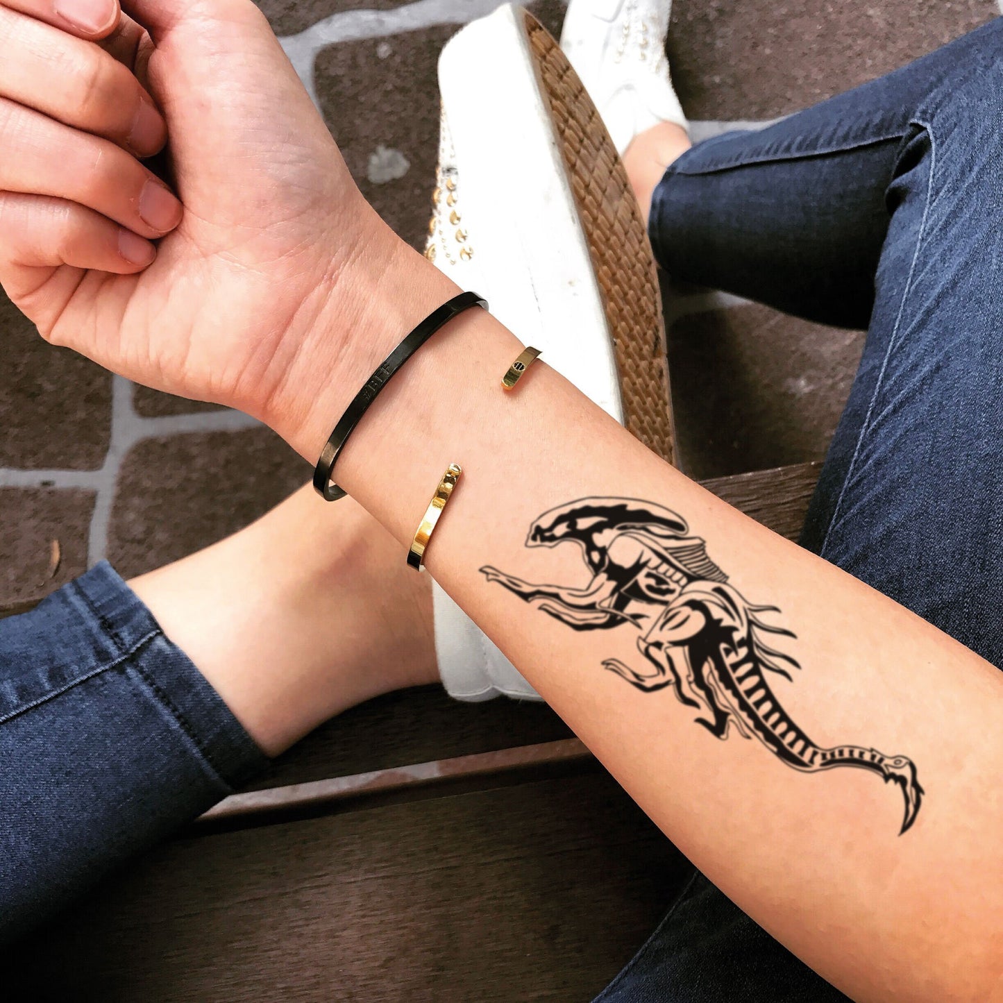 fake medium xenomorph illustrative temporary tattoo sticker design idea on forearm