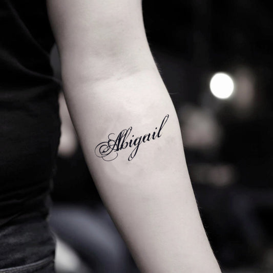 fake small abigail lettering temporary tattoo sticker design idea on inner arm