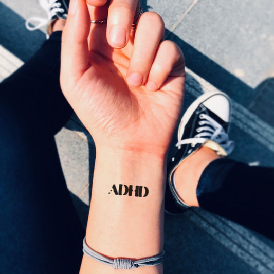 fake small adhd lettering temporary tattoo sticker design idea on wrist