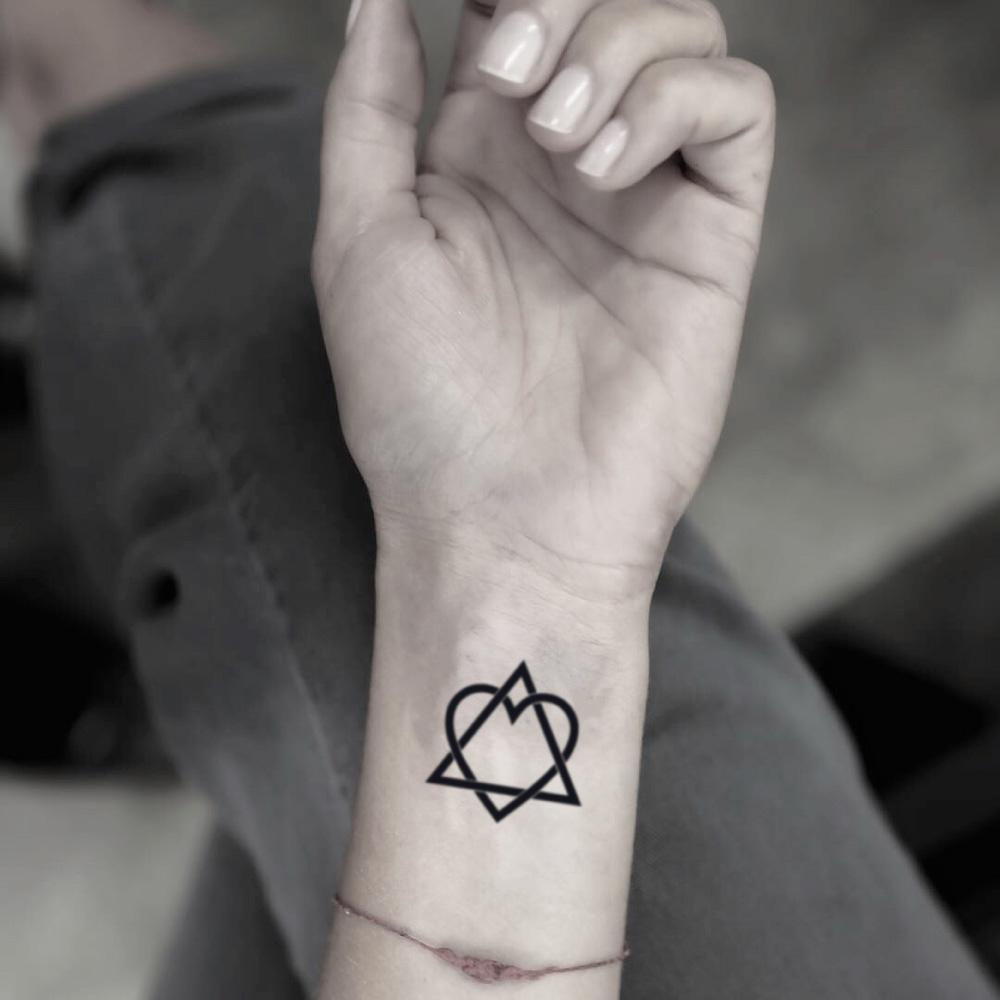 fake small adoption geometric temporary tattoo sticker design idea on wrist
