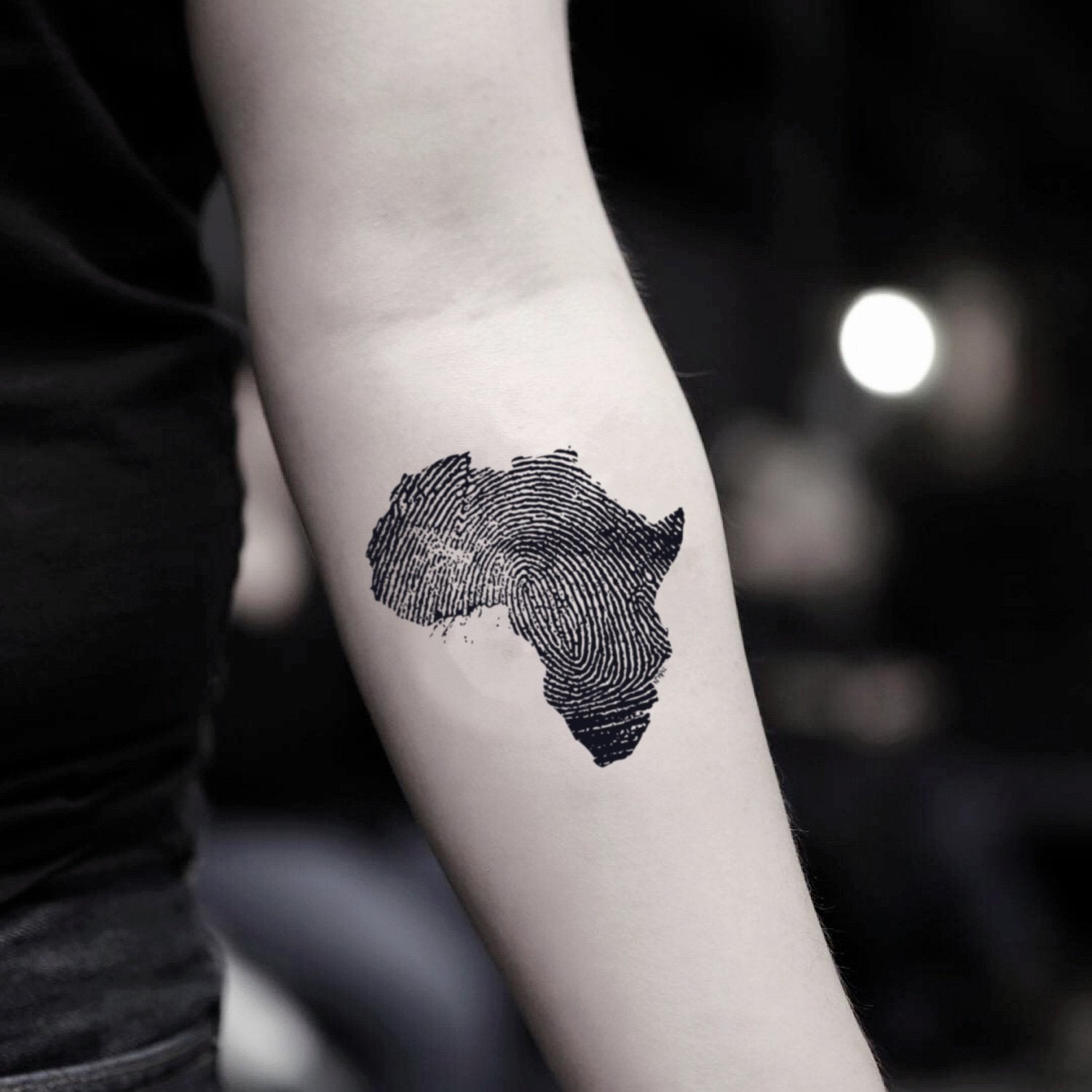 fake small west african continent illustrative temporary tattoo sticker design idea on inner arm