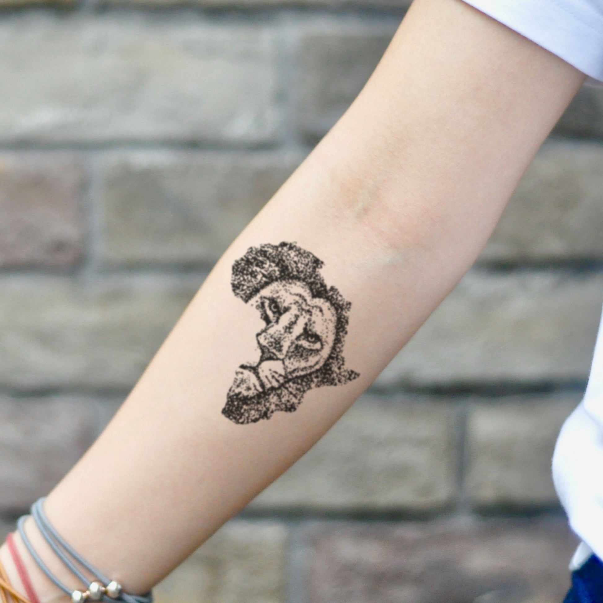 fake small african map lion black culture animal temporary tattoo sticker design idea on inner arm