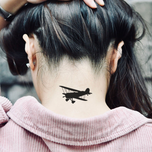 fake small aircraft minimalist temporary tattoo sticker design idea on neck