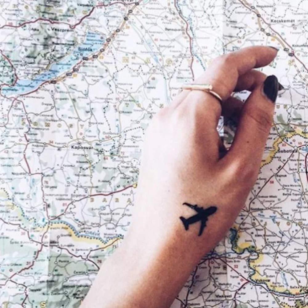 fake small airplane flight long distance minimalist temporary tattoo sticker design idea on wrist