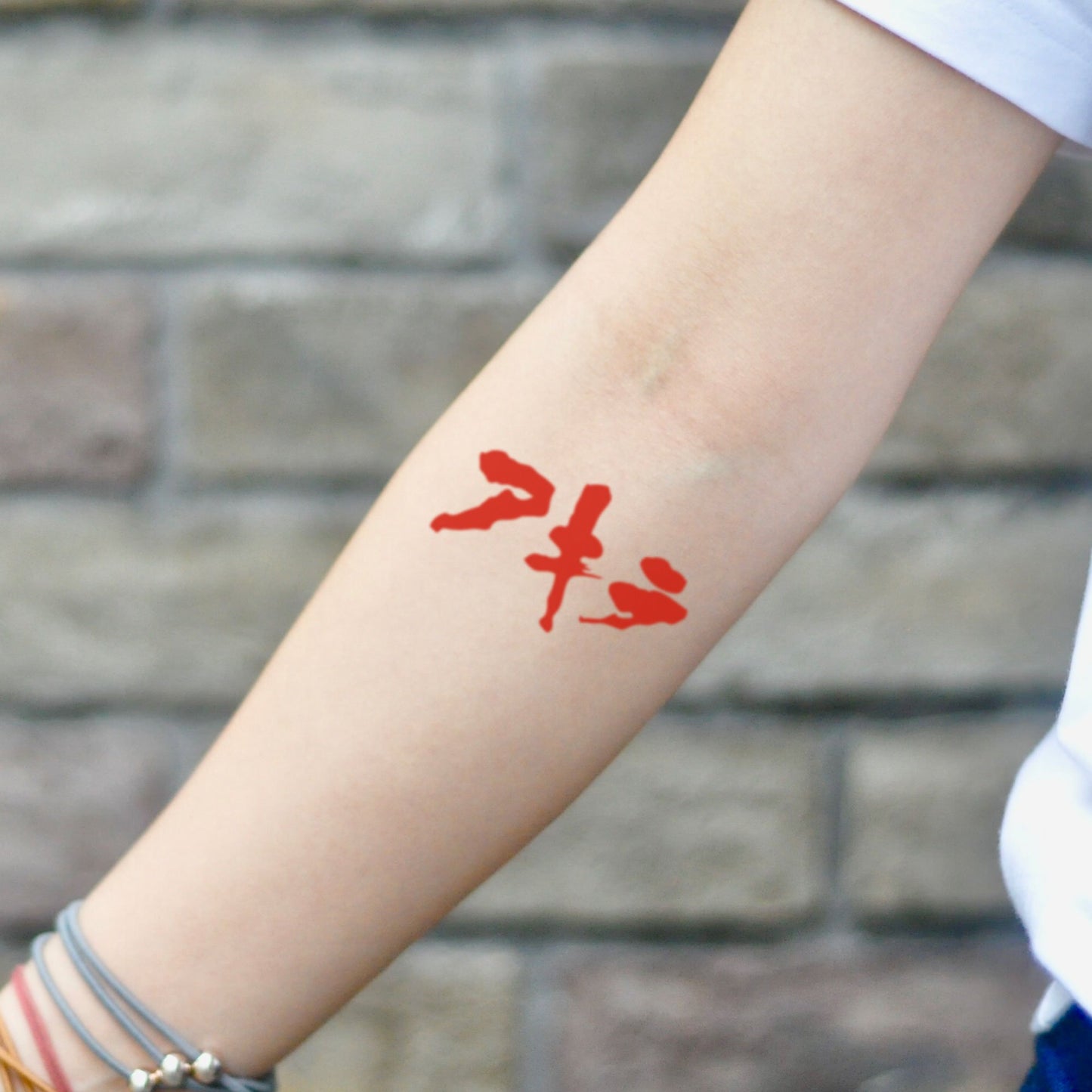 fake small akira color temporary tattoo sticker design idea on inner arm